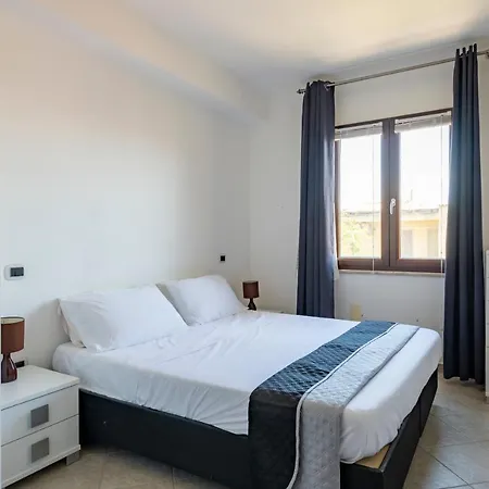 In Center Of With Balcony, Sea *